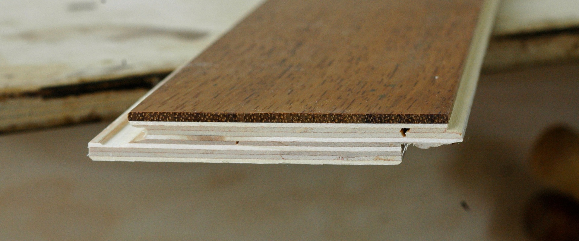 Can hardwood flooring be installed on concrete slab?