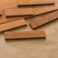 What are the primary advantages of engineered wood floors over solid wood?
