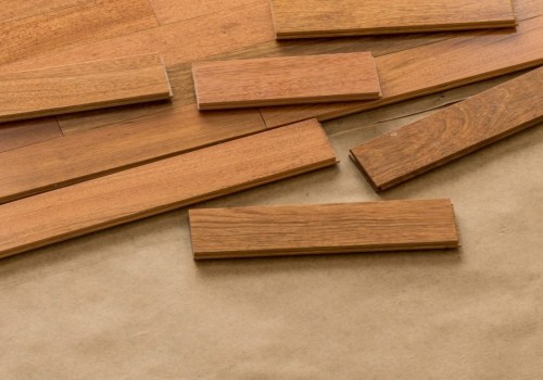 What are the primary advantages of engineered wood floors over solid wood?